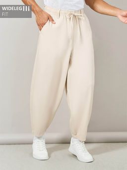 Styli - Men Cream Premium Cotton Slub Balloon Pants
