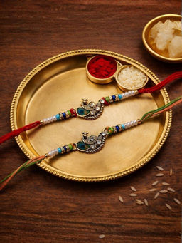 I Jewels - Peacock Thread Rakhi With Roli Chawal Rakshabandhan Card (Pack of 2)