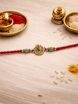 I Jewels - Cute Ganesha Thread Rakhi With Roli Chawal Rakshabandhan Card