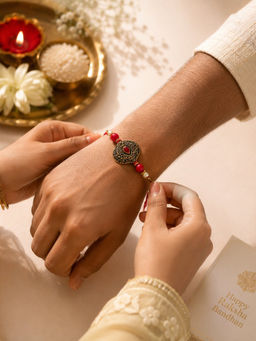 Niska - Antique Oxidised Designer Rakhi With Red Stone