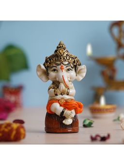 eCraftIndia - Orange Polyresin Handcrafted Lord Ganesha Idol Sitting on Rock