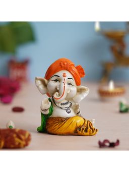 eCraftIndia - Orange Polyresin Handcrafted Dancing Lord Ganesha Idol while Sitting