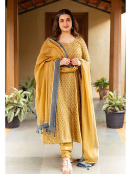 The Indian Ethnic Co. - Miral Mustard Solid Chanderi Silk Churidar