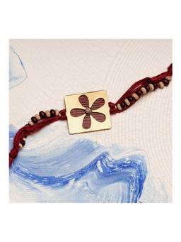 Suhani Pittie - Square Flower Rakhi in Maroon with Chandan & Tulsi Beads (22k Gold Plated)