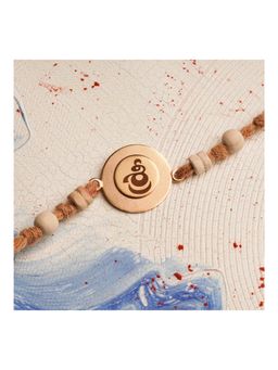 Suhani Pittie - Laser Shree Rakhi with Scroll & Tulsi Beads Charm (22k Gold Plated)