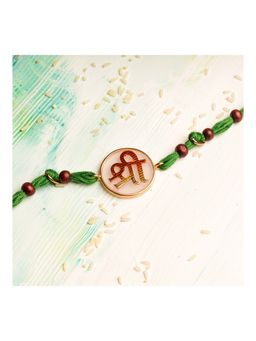 Suhani Pittie - Shree Rakhi Hand Painted On An Acrylic Disc (22k Gold Plated)