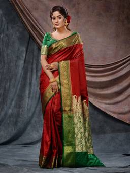 CHARUKRITI - Brick Red Emboss Silk Blend Handloom Saree with Unstitched Blouse