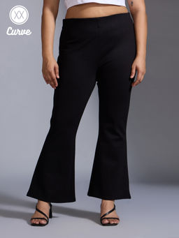 Twenty Dresses by Nykaa Fashion - Curve Black Solid High Waist Fit And Flare Jeggings