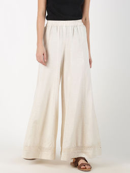 Saffron Threads - Off White Solid Flared Palazzos with Lace Inserts On Hem