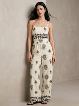 Outzidr - Cream Spaghetti Strap Printed Jumpsuit
