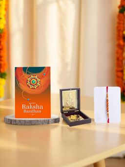 Golden Peacock - Rakhi Gift Set (Ganesh Idol, Rakhi, Card)