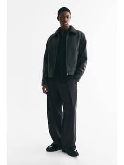 H&M - Men Black Loose Fit Tailored Trousers