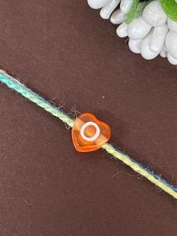 Digital Dress Room - Letter O Colorful Heart Kids Rakhi