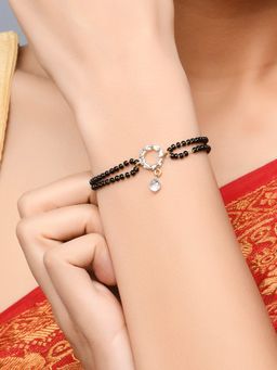 Fida - Wedding Luxurious Gold Plated American Diamond Stones and Black Beads Bracelet for Women