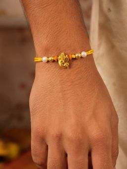 Digital Dress Room - Ganesha Charm Pearl Rakhi