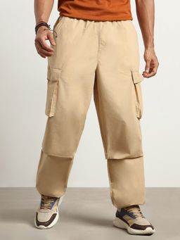 Nobero - Men Beige Oversized Cargo Pocket Parachute Pant