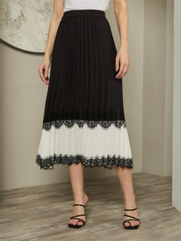 Styli - Women Black And White Colorblocked Pleated Midi Skirt