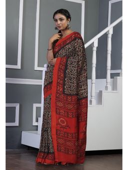 Unnati Silks - Black Ajrakh Printed Soft Silk Saree & Unstitched Blouse UNM81572