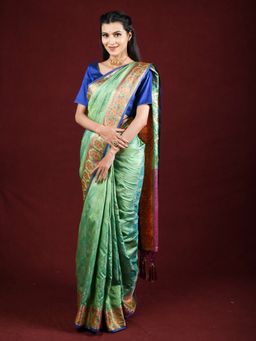 EXCLUSIVA - Green Banarasi Blended Silk Woven Saree Zari Work with Unstitched Blouse