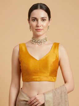 SALWAR STUDIO - Mustard Silk Solid Sleeveless Readymade Saree Blouse