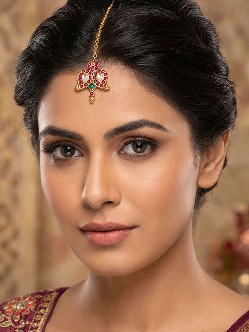 Niscka Gold Plated Maang Tika with Red and Green Stones and White Kundan