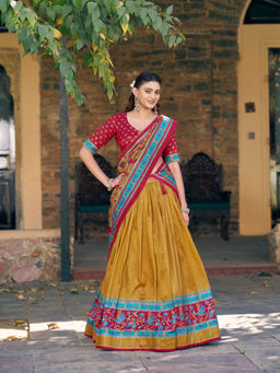 LooknBook Art - Women Yellow Silk Tassels Stitched Lehenga and Unstitched Blouse with Dupatta