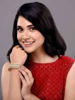 Saraf RS Jewellery - A Pair of 2 Gold Dual Toned AD Studded Hand Crafted Textured Bangles