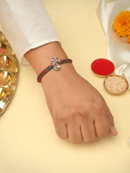 Kicky and Perky - 925 Sterling Silver Shri Ganesh Ji Moissanite Rakhi With Roli Chawal