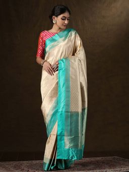 WeaverStory - Handloom Off-white And Gold Zari Brocade Banarasi Saree With Unstitched Blouse
