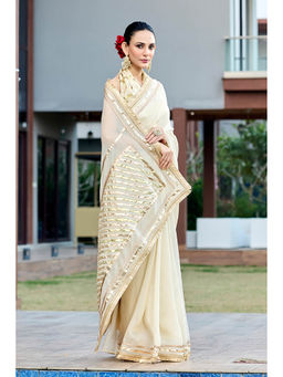 Aparnaa - Beige Tissue Saree with Unstitched Blouse
