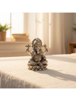 eCraftIndia - Golden Brass Blessing Lord Ganesha Idol Sitting On Lotus Flower