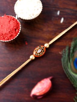 Shoshaa - Gold and Orange Kundan-Studded Bhai Rakhi with Roli Chawal (Set of 2)