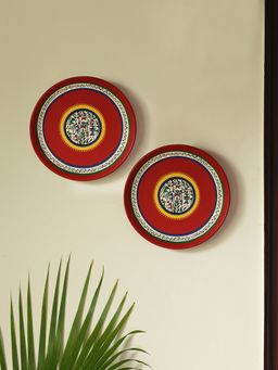 ExclusiveLane - 'The Warli Tales' Hand-painted Terracotta Wall Plates Wall DÃ©cor (Set of 2, Red)