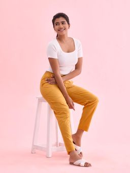 Go Colors - Women Solid Light Mustard Mid Rise Cotton Pants