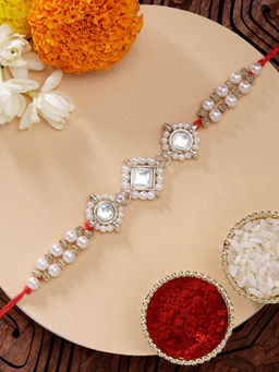 Karatcart - Beautiful Classic Pearls and Kundan Rakhi with Roli Chawal