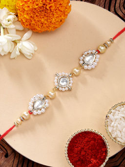 Karatcart - Beautiful Pearls and Kundan Rakhi with Roli Chawal