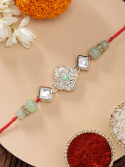 Karatcart - Beautiful Floral Kundan Rakhi with Roli Chawal