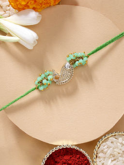 Karatcart - Beautiful Fish Shape Kundan Rakhi with Roli Chawal