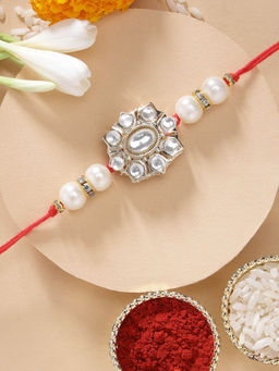 Karatcart - Stylish Floral Design Pearl and Kundan Rakhi with Roli Chawal
