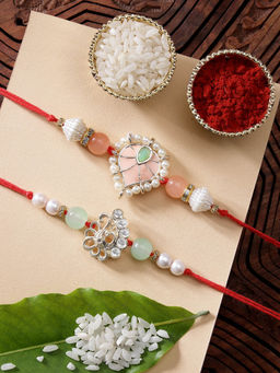 Karatcart - Set Of 2 Meena Heart Shape Kundan Rakhi with Roli Chawal