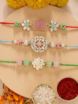 Karatcart - Set Of 3 Carved Stone Floral Kundan Rakhi with Roli Chawal