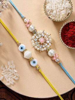 Karatcart - Set Of 2 Evil Eye and Floral Kundan Rakhi with Roli Chawal