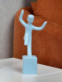 At Home by Nilkamal - Man With One Foot On Box Dolomite Showpiece (Blue)