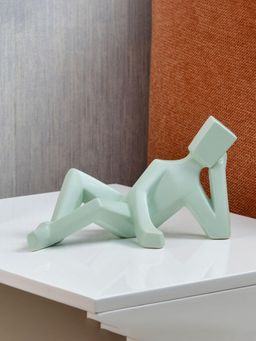 At Home by Nilkamal - Man Laying Down Dolomite Showpiece (Green)