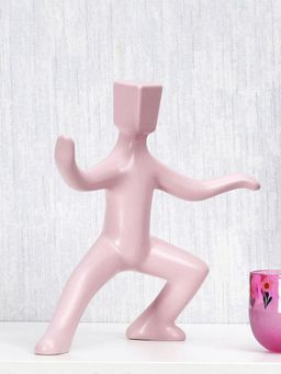 At Home by Nilkamal - Man Standing With Bent Knee Dolomite Showpiece (Pink)