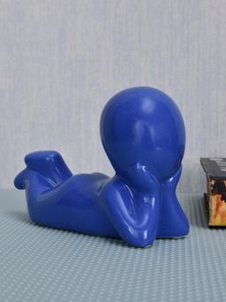 At Home by Nilkamal - Boy Resting Polyresin Decorative Showpiece (Blue)