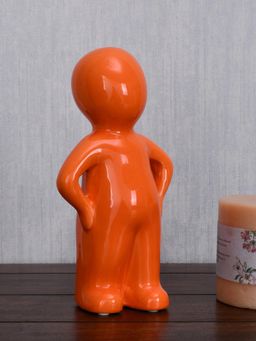 At Home by Nilkamal - Standing Boy Polyresin Decorative Showpiece (Orange)