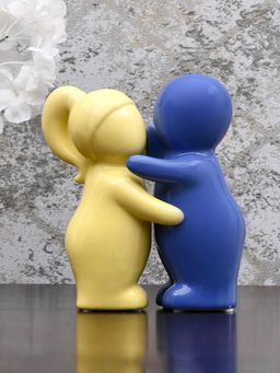 At Home by Nilkamal - Two Children Hugging Polyresin Decorative Showpiece (Yellow & Blue)