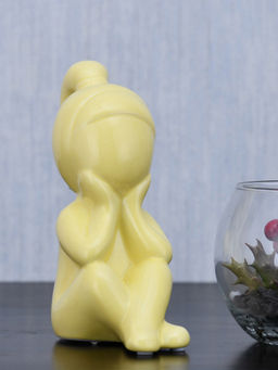 At Home by Nilkamal - Girl Sitting with Hand On Chin Polyresin Decorative Showpiece (Yellow)