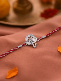 Ornate Jewels - 925 Silver American Diamond Lord Ganesha Thread Rakhi for Brother With Roli Chawal